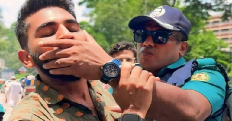 শিক্ষার্থীর মুখ চেপে ধরা পুলিশ পরিদর্শক বরখাস্ত
