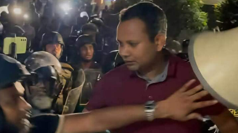 মেরুন রঙের পোশাক পরিহিত যুবক ডিবির কেউ নয় : ডিবিপ্রধান