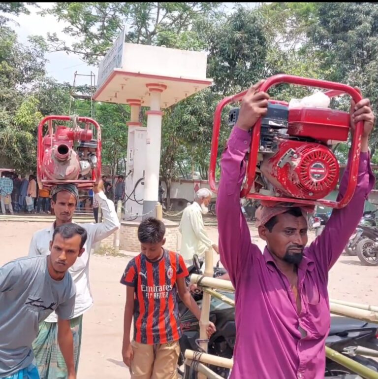 শরীয়তপুরে সেচপাম্প কাঁধে নিয়ে ফিলিং স্টেশনে কৃষক, ভিডিও ভাইরাল।